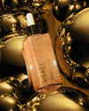 Rozświetlający olejek do ciała z efektem Gold Skin 100 ml